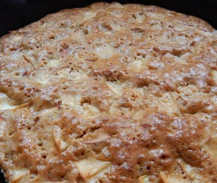 Apple pie in a baking dish close up Stock Photos