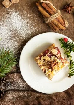 Apple pie bars with jam, spices and crumble. Christmas, New Year background. Stock Photos