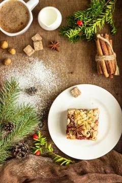 Apple pie bars with jam, spices and crumble. Christmas, New Year background. Stock Photos