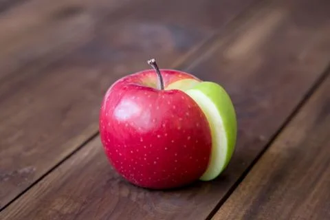 Apple pie chart made from green sector in a red circle Stock Photos