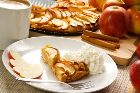 Apple pie with cream Stock Photos