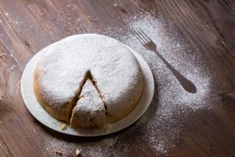 Apple pie dusted with icing sugar Stock Photos