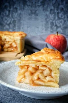 Apple pie with fresh apple on white background Stock Photos