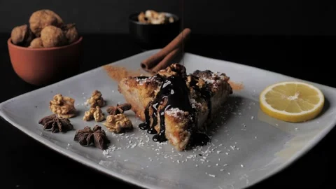 Apple pie with hot chocolate on top, festively decorated plate, dark backgrou Stock Footage 143139998