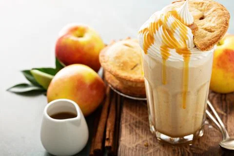 Apple pie milkshake with syrup Stock Photos