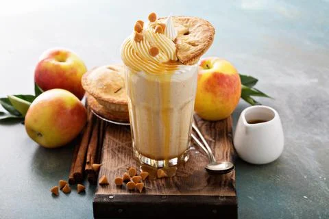 Apple pie milkshake with syrup Stock Photos