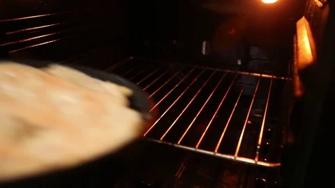 Apple pie in the oven. Stock Footage 70240139