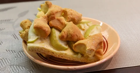 Apple pie piece on gray table background. Video stock 87513871