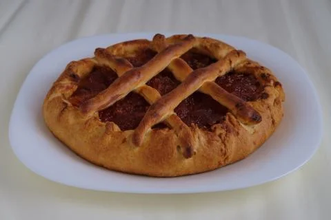 Apple pie on a plate. Stock Photos