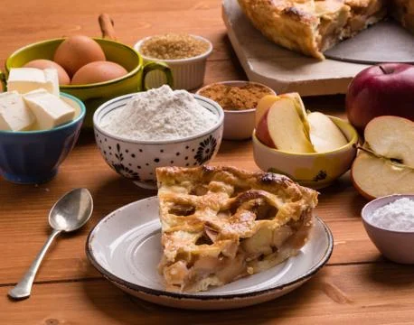 Apple pie slice with ingredients Stock Photos