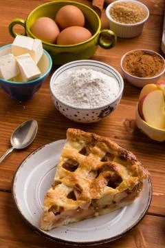 Apple pie slice with ingredients Stock Photos