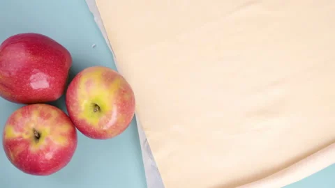 Apple pie, small traditional on a blue background. Cooking process, Video stock 146711543