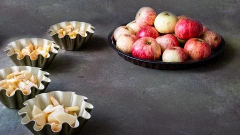 Apple pie in white ceramic baking dish. Homemade breakfast with apples and a Stock Photos
