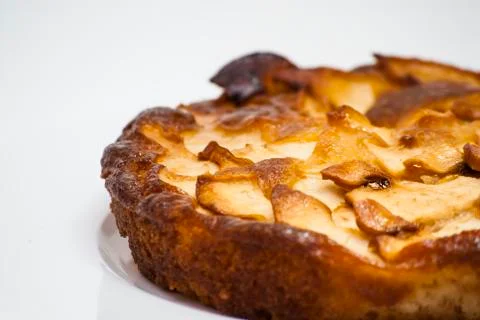 Apple pie on a white plate Stock Photos