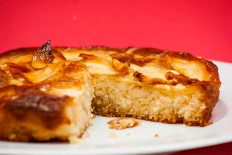 Apple pie on a white plate Stock Photos