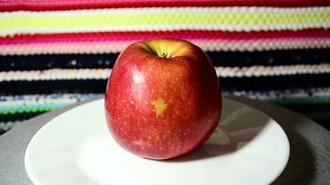 Apple on a plate Stock-Footage 143153880
