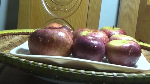 Apple on plate Stock Footage 292336457