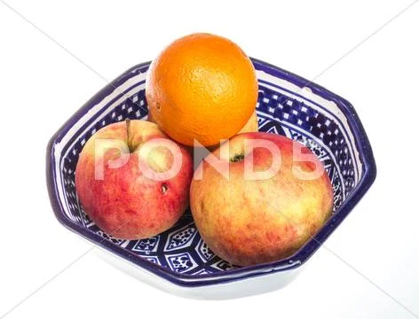 Apple on a plate isolated on white background Stock Photos