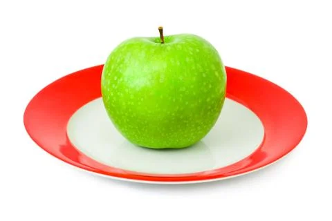 Apple on plate Stock Photos