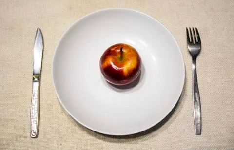 Apple on a plate Stock Photos