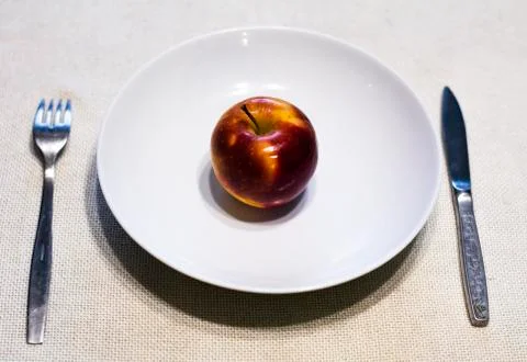 Apple on  a plate Stock Photos