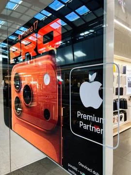 Apple Premium Partner store display featuring iPhone Pro camera design and .. Stock Photos