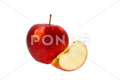 Apple with quarter Stock Photos