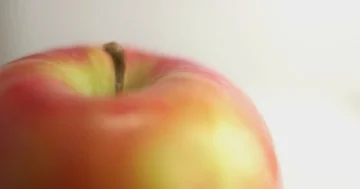 Apple revolving in macro Stock Footage 85471364