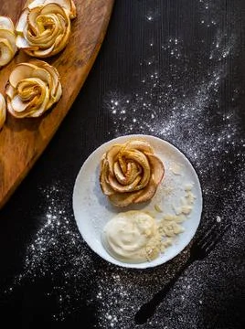 Apple roses, apple buns, serving with whipped cream and almond petals, 스톡 사진