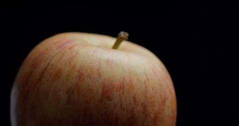 Apple rotating close-up / macro with water spray slowmotion 4k Video stock 93274240