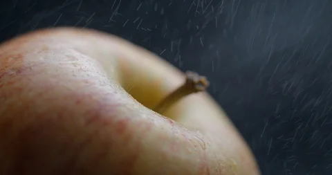 Apple rotating close-up / macro with water spray slowmotion 4k Video stock 93274298