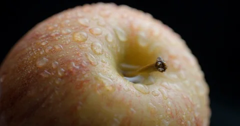 Apple rotating close-up / macro with water spray slowmotion 4k Video stock 93274489