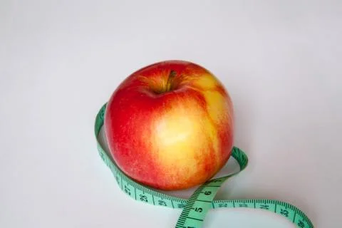 Apple with a ruler Foto stock