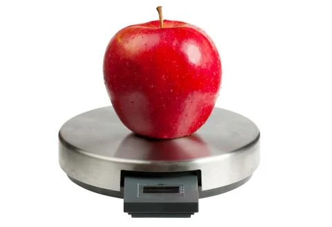 Apple on a scales Foto stock