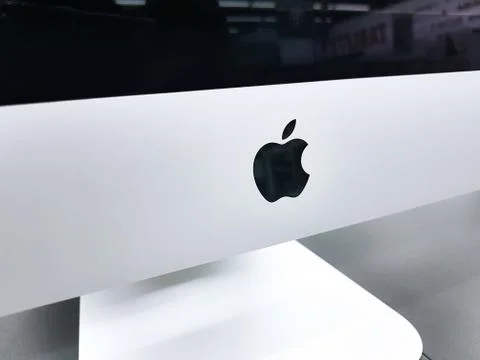Apple sign on iMac computer Stock Photos