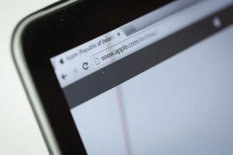 Apple site on tablet screen Stock Photos
