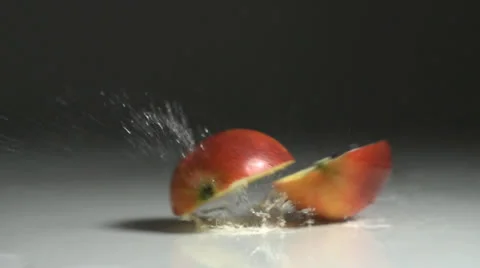 Apple sliced in slow motion Stock Footage 24736085