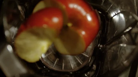 Apple slices falling in a blender, Ultra Slow Motion Stock-Footage 86577698