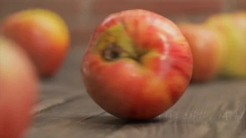An Apple Spinning Whirling Around Between Other Apples, Closeup No. 2 Stock Footage 99137229