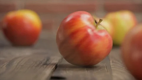 An Apple Spinning Whirling Around Between Other Apples, Closeup No. 1 Stock Footage 99137249