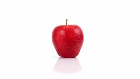 Apple spinning on white background Video stock 220092718