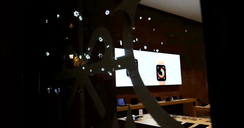 Apple Store with Apple Watch Ads and iPads Displayed Stock Footage 282404601
