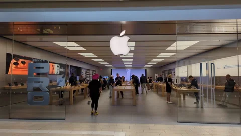 Apple Store With Customers. Customers Browsing, Trying and Buying Apple Pro.. Stock-Footage 327876220