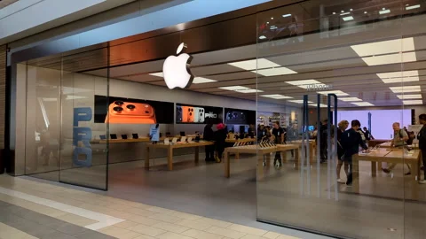 Apple Store With Customers. Customers Browsing, Trying and Buying Apple Pro.. Stock Footage 327881714