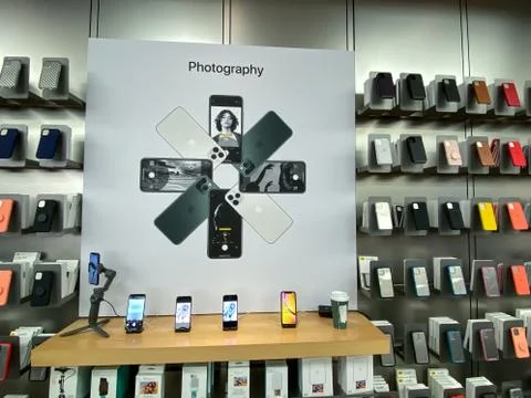 An Apple store display of Photography Accessories for customers to purchase. Stock Photos