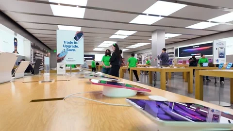 Apple store interior, computers, staff, customers, consumer electronics, iphones Stock Footage 307874162