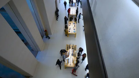 Apple Store interior people shopping for new iPad iMac Apple Watch Stock Footage 118021638