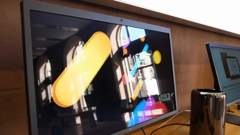 Apple Store interior with the previous generation of Mac Pro workstation Stock Footage 129711305