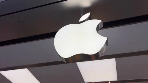 Apple store phones iPhones laptops people buy Apple sign Guildford Town Center Stock Footage 220042012