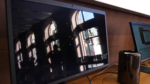 Apple Store with the previous generation of Mac Pro workstation aka trashcan Stock Footage 131782647